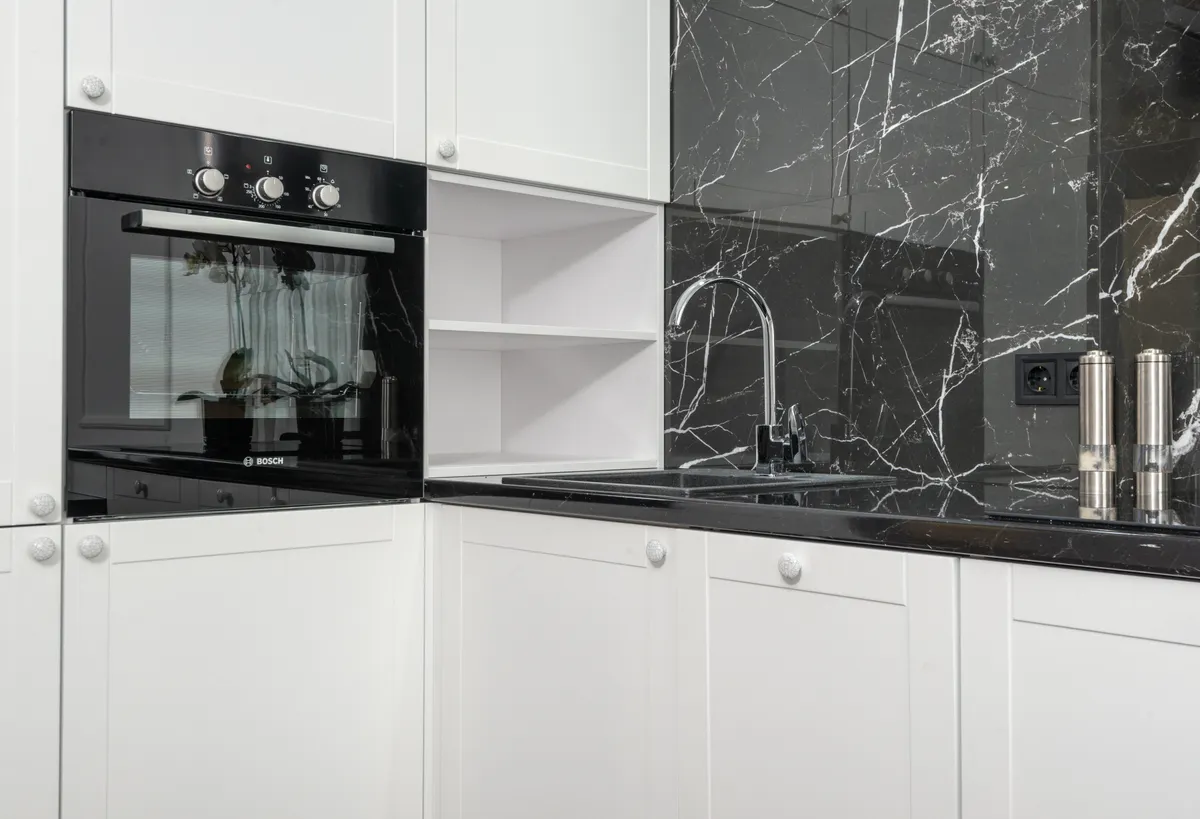 Close-up view of various kitchen cabinet finishes to help identify the right cleaning method.