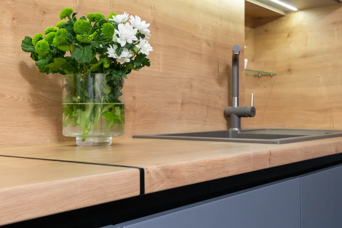 Smooth painted wooden kitchen cabinet panels showing a solid color finish.