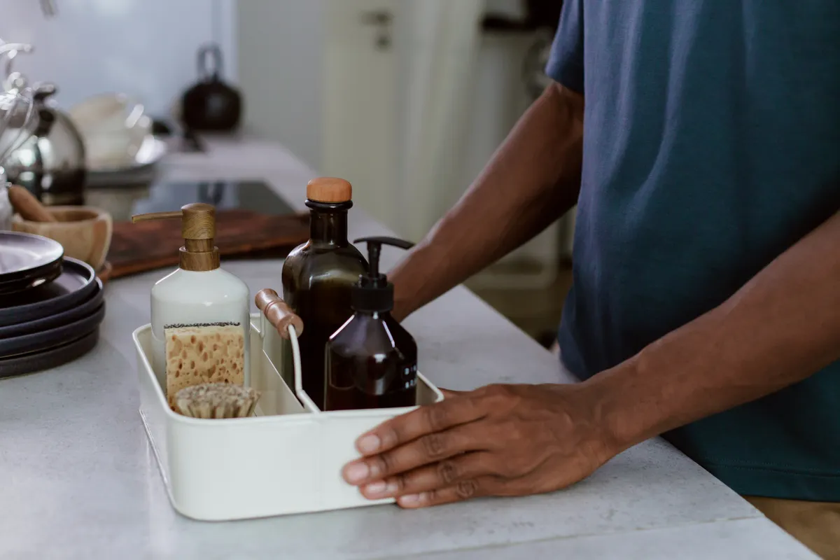 Close-up of recommended cleaning products for wood countertops, including mineral oil.