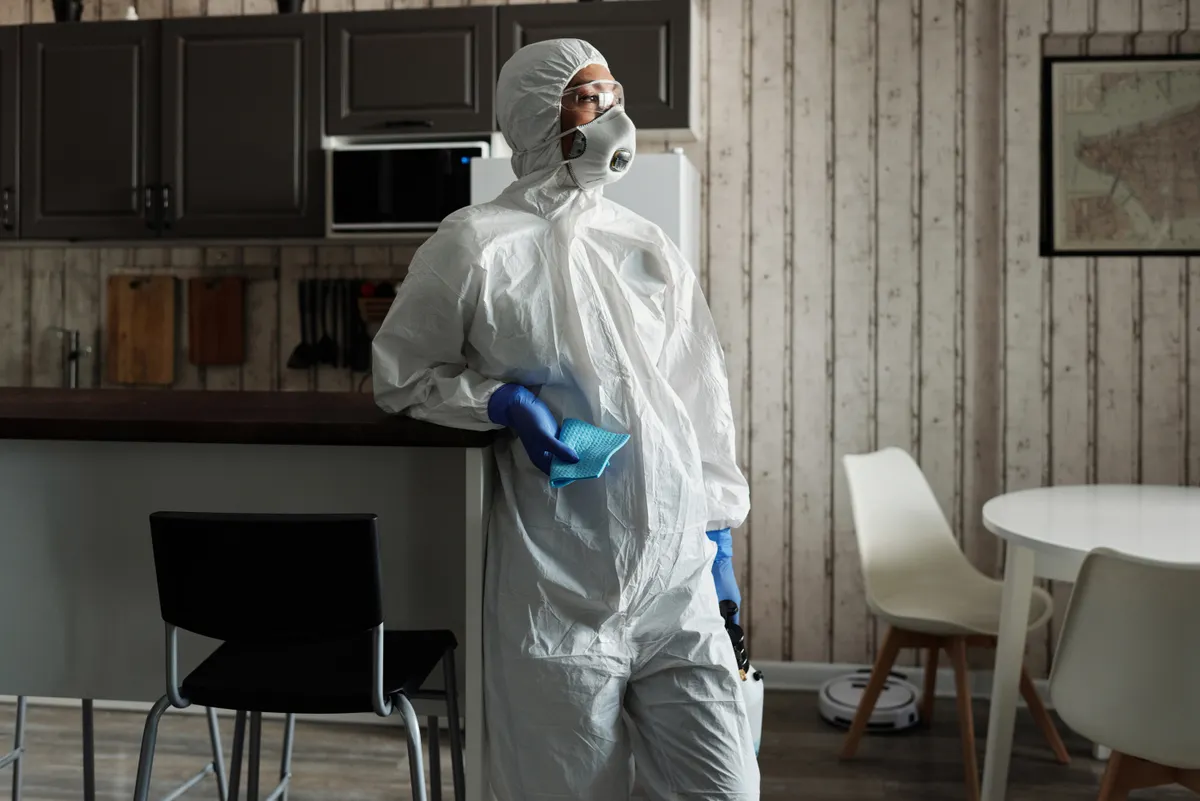 A person reviewing common kitchen cleaning mistakes to avoid during special situations.